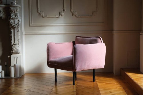 the interior of the living room is in english style with a pink velour chair against a light wall, with a wooden floor or parquet. - home decoration stock pictures, royalty-free photos & images