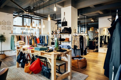 the retail displays in fashionable clothing store - fashion stock pictures, royalty-free photos & images