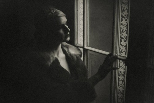 the woman at the window at night. - fashion stock pictures, royalty-free photos & images