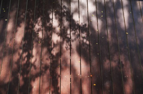 the wooden terrace with light and shadow - garden decoration stock pictures, royalty-free photos & images