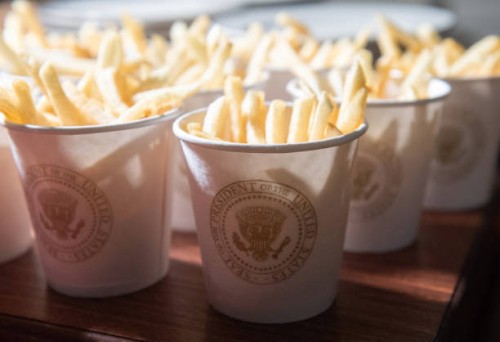 This photo shows French fries placed inside Presidential cups, some of the fast food the US president purchased for a ceremony honoring the 2018...