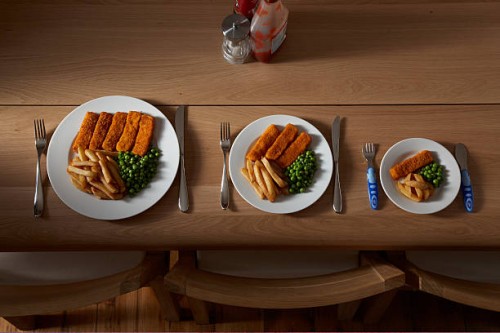 three different sized portions of food on plate - food stock pictures, royalty-free photos & images