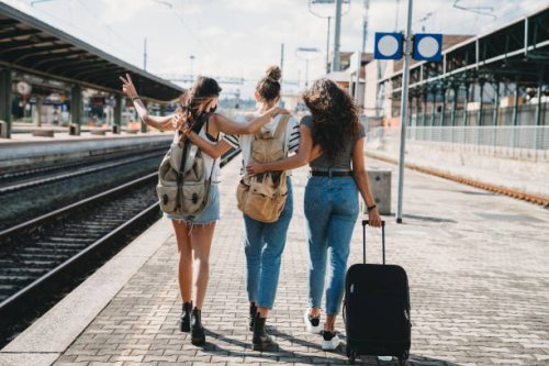 three friends enjoying a trip together - rear view - travel stock pictures, royalty-free photos & images