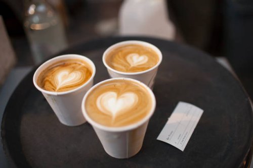 three takeaway cups of coffee with heart shaped tops - junk food stock pictures, royalty-free photos & images