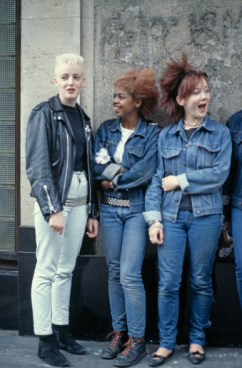 Three teenage girls wearing post punk fashions, 1980.