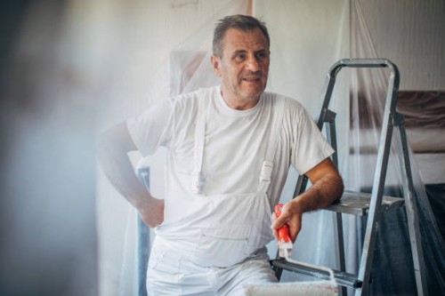 tired mature man house painter - home decoration stock pictures, royalty-free photos & images