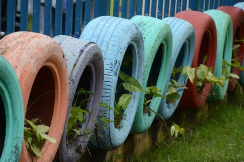 tires - potted plants - garden decoration stock pictures, royalty-free photos & images