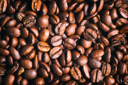 toasted coffee beans background - coffee stock pictures, royalty-free photos & images