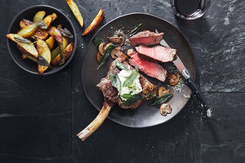tomahawk beef steak with mushrooms, burrata and sage potato wedges - food stock pictures, royalty-free photos & images