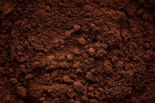 top view close-up of grinded coffee beans - coffee stock pictures, royalty-free photos & images
