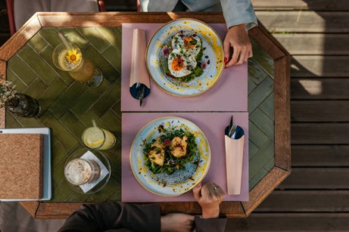 top view of a table at a cafe with breakfast food and drinks - food stock pictures, royalty-free photos & images