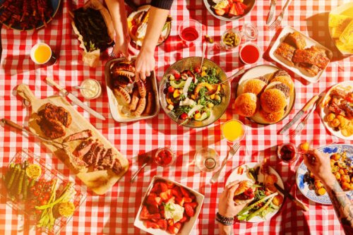 top view of fast food, hands and people at picnic, lunch meal or snack with barbecue, casual cuisine for nutrition and health. diner, cooking and culinary experience with buffet or summer restaurant - junk food stock pictures