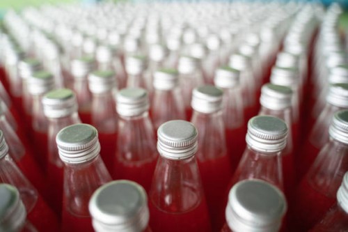 top view red juice, fruit mixed with basil seeds, clear bottle, flavored with pineapple flavor, ready to drink for health. - food stock pictures, royalty-free photos & images