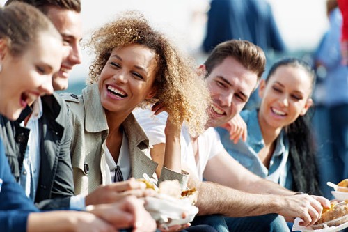 tourists and friends having a snack in ortakoy - junk food stock pictures, royalty-free photos & images