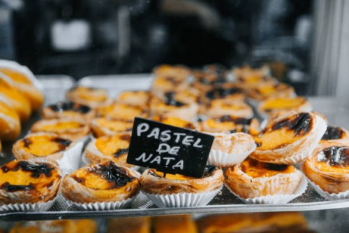 traditional portuguese pastry on window shop - food stock pictures, royalty-free photos & images