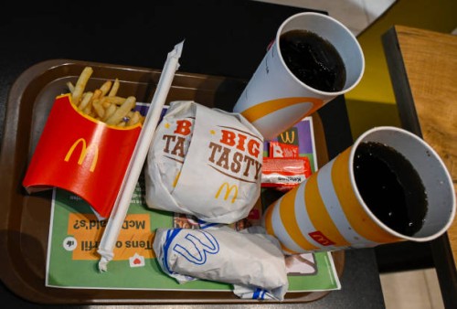 Tray with food and drinks at McDonald's in Rossio Square on September 21, 2024 in Lisbon, Portugal. McDonald's arrived in Portugal in 1991, and with...