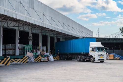truck is carrying container is parking in front warehouse - food stock pictures, royalty-free photos & images