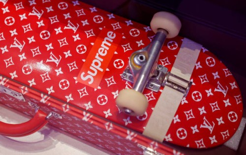 Trunk and a skateboard for Louis Vuitton and Supreme are displayed during "Mode Et Sport, D'un Podium A L'Autre" exhibition at Musee Des Arts...