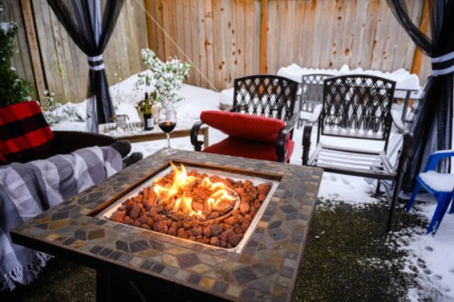 turning the backyard patio into a winter relaxation space - garden decoration stock pictures, royalty-free photos & images