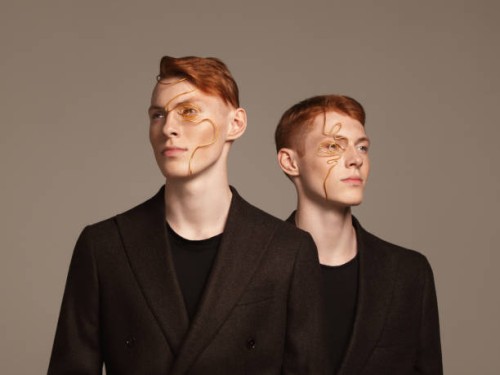 twins wearing wire masks - fashion stock pictures, royalty-free photos & images