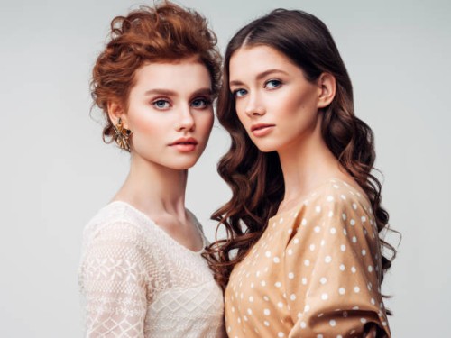 two beautiful woman - fashion stock pictures, royalty-free photos & images