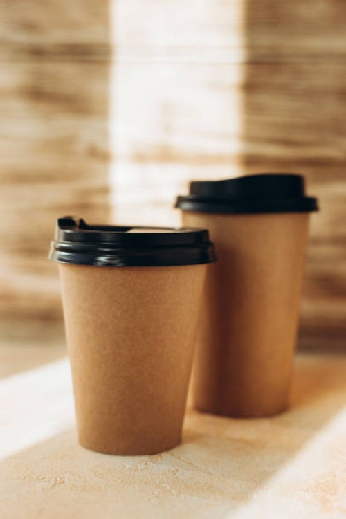 two craft hot drink cups with black lid on wooden background - junk food stock pictures, royalty-free photos & images