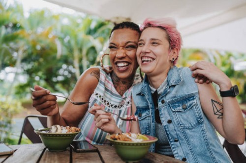 two friends eating dessert in restaurant - food stock pictures, royalty-free photos & images