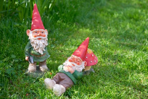 two garden gnomes - garden decoration stock pictures, royalty-free photos & images