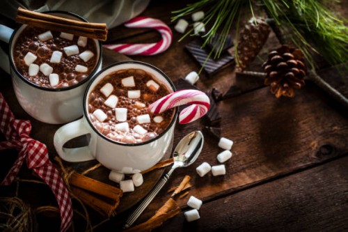 two homemade hot chocolate mugs with marshmallows on rustic wooden christmas table - home decoration stock pictures, royalty-free photos & images