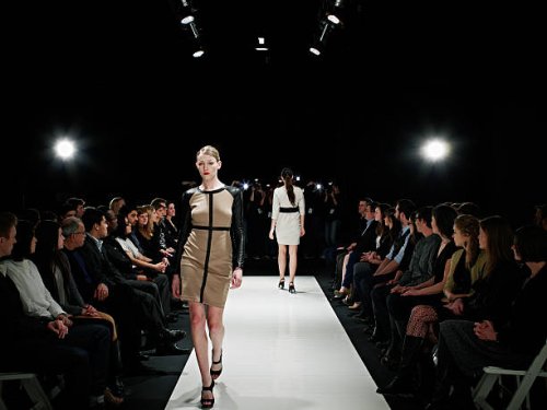 two models walking on catwalk during fashion show - fashion week stock pictures, royalty-free photos & images
