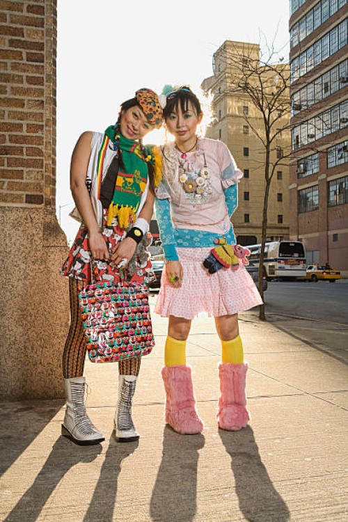 two women standing on sidewalk, portrait - fashion stock pictures, royalty-free photos & images