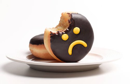 unhealthy doughnut on plate - junk food stock pictures, royalty-free photos & images