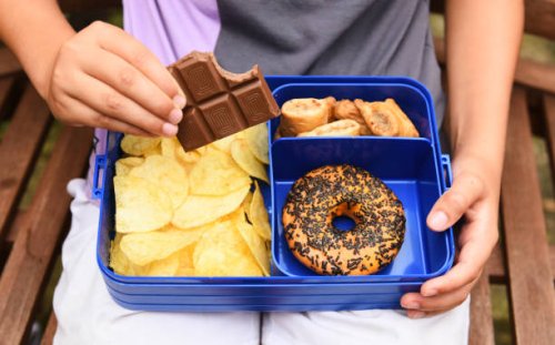 unhealthy school lunch box - junk food stock pictures, royalty-free photos & images