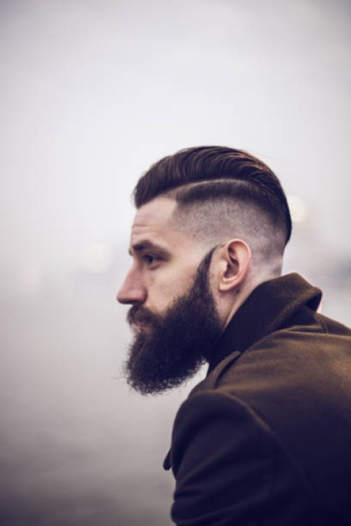 urban man with beard - hairstyle stock pictures, royalty-free photos & images