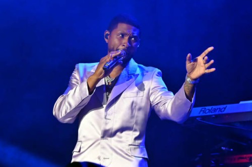 Usher performs during the Strength Of A Woman Festival & Summit State Farm Arena Concert at State Farm Arena on May 07, 2022 in Atlanta, Georgia.