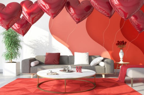valentine's day concept with a red room full of heart shaped balloons - home decoration stock pictures, royalty-free photos & images