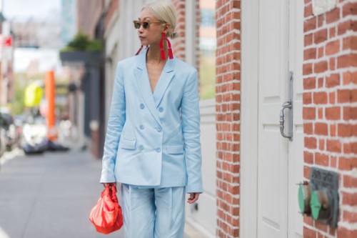 Vanessa Hong wearing a blue suit, red earings seen in the streets of Manhattan outside Tibi during New York Fashion Week on September 9, 2017 in New...