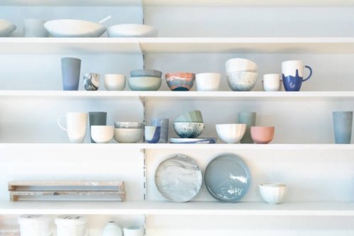 various earthenware on rack in pottery studio - home decoration stock pictures, royalty-free photos & images