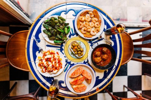 various tapas served in a tapas bar, directly above view - food stock pictures, royalty-free photos & images