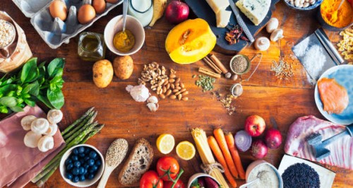 various types of food on wooden table - food stock pictures, royalty-free photos & images