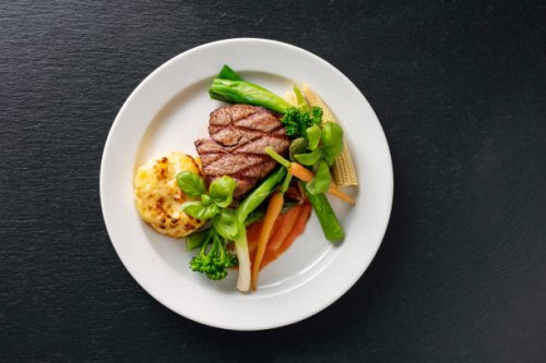 veal tenderloin with sesonal vegetables. - food stock pictures, royalty-free photos & images