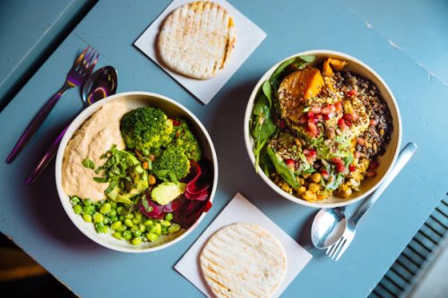 vegan bowls with various vegetables and seeds, high angle view - food stock pictures, royalty-free photos & images