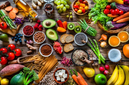 vegan food backgrounds: large group of fruits, vegetables, cereals and spices shot from above - food stock pictures, royalty-free photos & images