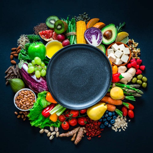 vegan food shot from above on dark background. copy space - food stock pictures, royalty-free photos & images