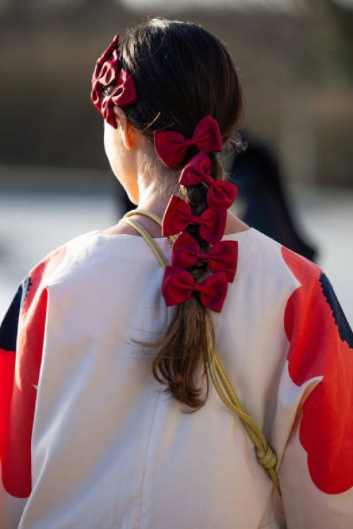 Vicky Montanari wears bowknot hair band outside Marimekko during the Copenhagen Fashion Week AW24 on February 01, 2024 in Copenhagen, Denmark.