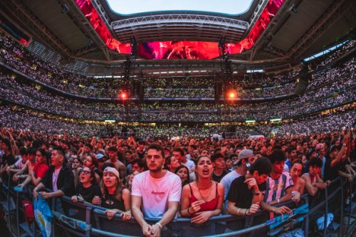 View of fans while Argentine rapper Duki performs on stage at Estadio Santiago Bernabeu on June 08, 2024 in Madrid, Spain.
