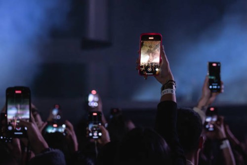 View of the crowd with cell phones taking pictures during Rels B concert at Palau Sant Jordi on March 07, 2025 in Barcelona, Spain.