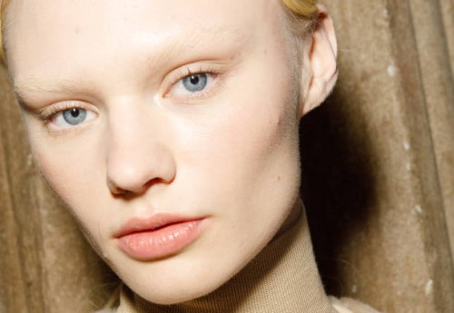 Vilma Sjöberg, make up detail, poses backstage at the Max Mara fashion show during the Milan Fashion Week Womenswear Fall/Winter 2023/2024 on...