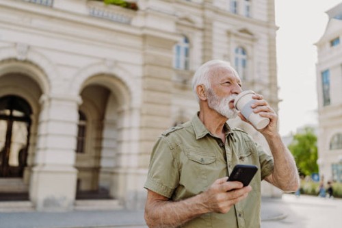 walking on the street - junk food stock pictures, royalty-free photos & images