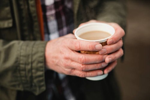 warming up with a coffee - junk food stock pictures, royalty-free photos & images